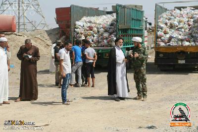  آیت اللہ سیستانی کی جانب سے عراق کے بے گھر سنی مسلمانوں کے درمیان امداد تقسیم